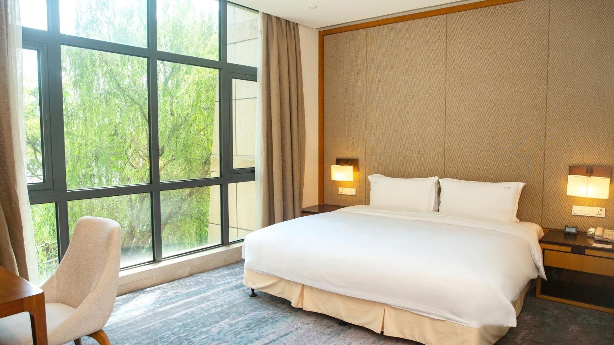 Holiday Inn Kunshan Huaqiao By Ihg מראה חיצוני תמונה